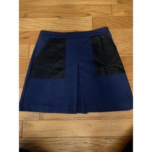ASOS, women's navy blue with black pockets and back zip up closure skirt size 4